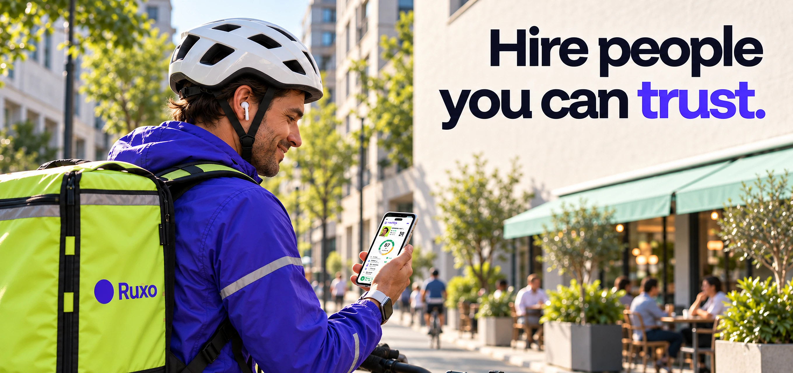 Hire people you can trust. A Ruxo delivery courier on an e-bike checks his verified PROFID profile on his phone: Ready to work.