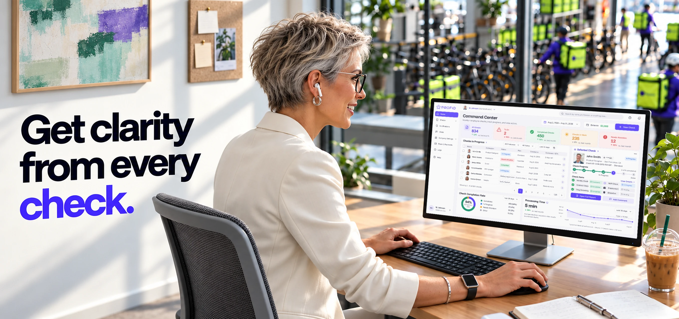 Get clarity from every check. A hiring manager reviews the PROFID Command Center while couriers start their shift behind the glass.